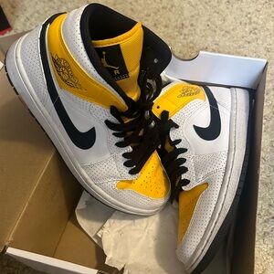 Yellow and black with white Jordans